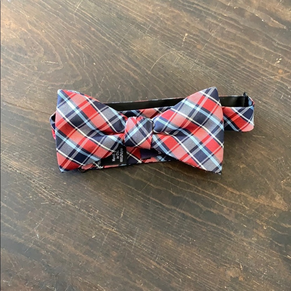 Men’s adjustable red and blue bow tie.